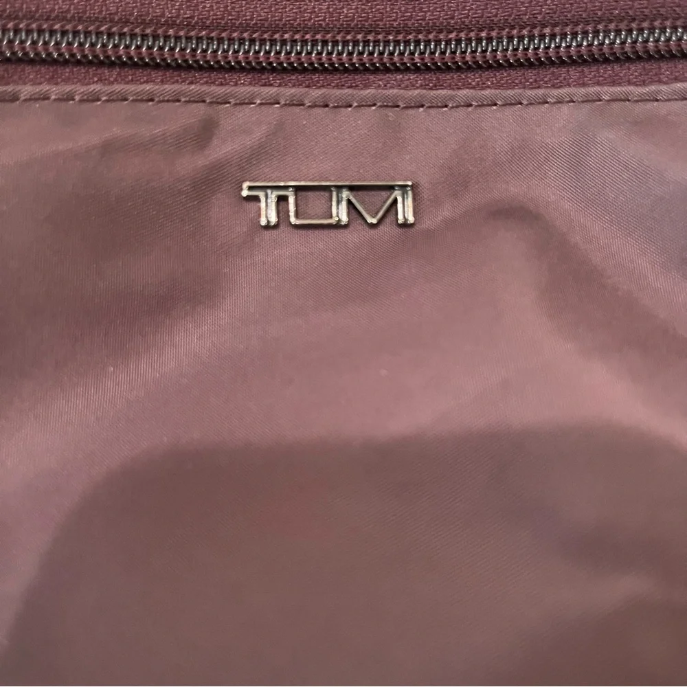 Tumi‎ maroon Backpack with Classic Design and Durable Build